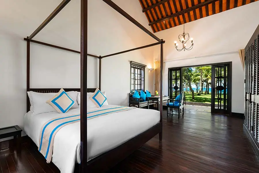 bedroom of the ocean view villa at RMH Le Belhamy Beach Resort